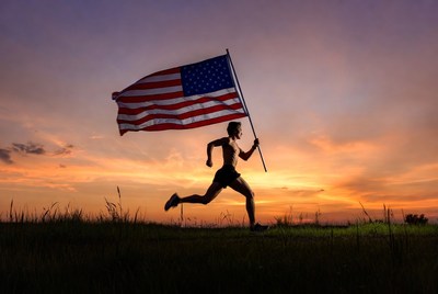 Man running with American flag