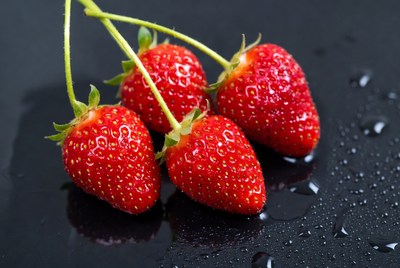 Fresh Strawberries on Black Background