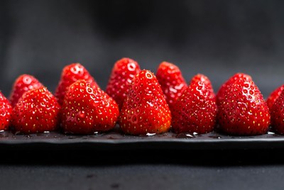 Fresh Strawberries on Black Plate