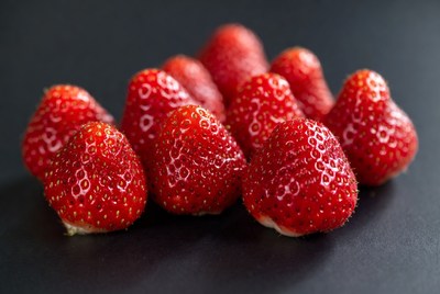 Fresh strawberries on black background