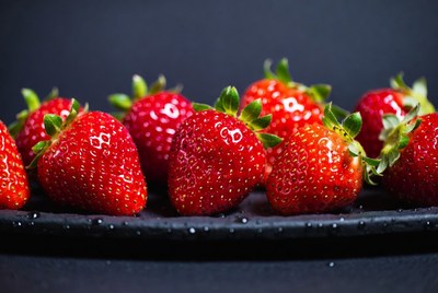Fresh Strawberries on Black Plate