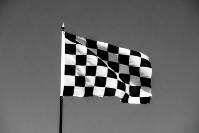 Checkered racing flag waving