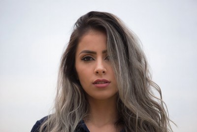 Latina woman with balayage hair