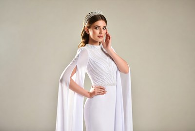 Woman in white gown with tiara