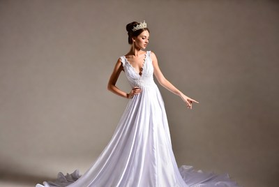 Woman in white lace wedding gown with tiara