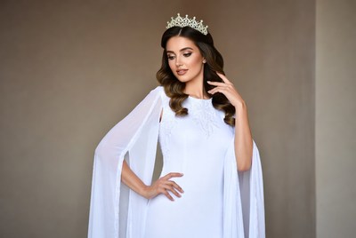 Woman in white gown with tiara