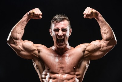 Muscular man flexing biceps