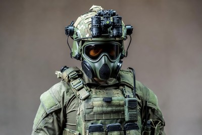 Soldier in gas mask and helmet