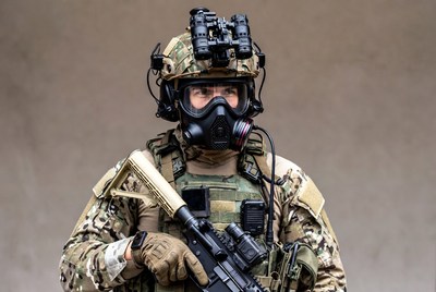 Soldier in gas mask with rifle