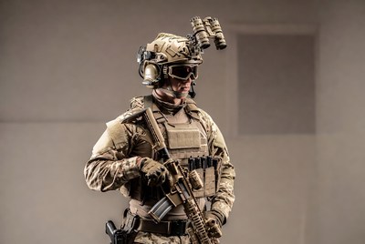 Soldier in tactical gear with rifle