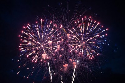 Vibrant Red Blue Fireworks Night Sky