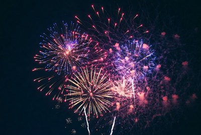 Colorful Fireworks Exploding in Night Sky