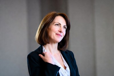 Smiling businesswoman in suit