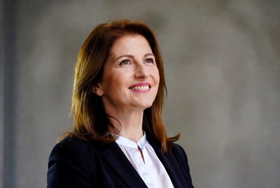 Smiling woman in navy blazer