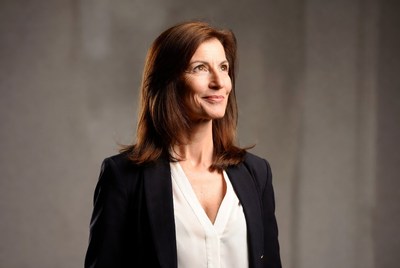Smiling woman in blazer suit