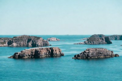 Rocky Islands in Calm Blue Sea