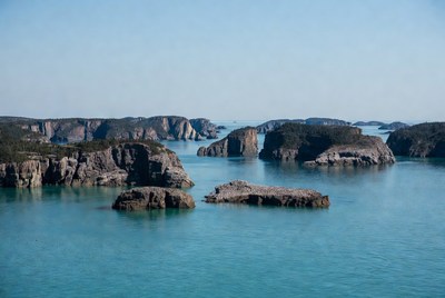 Turquoise Sea with Rocky Islands