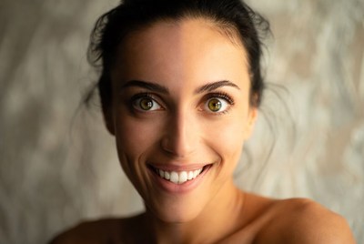 Smiling woman with green eyes