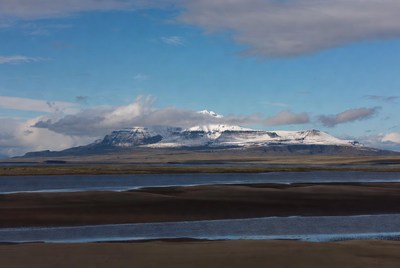 Snowy Mountain Over River Valley
