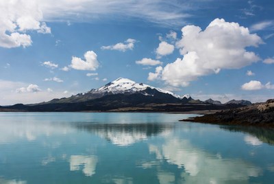 Snowy Mountain Reflecting in Lake