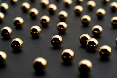 Shiny Gold Balls on Black Background