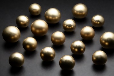 Gold Metallic Spheres on Black Background