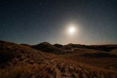 Full Moon Over Grassy Hills