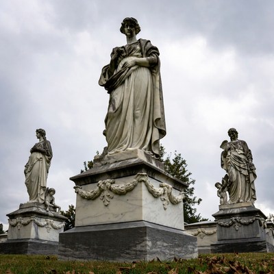 Classical Marble Statues in Cemetery