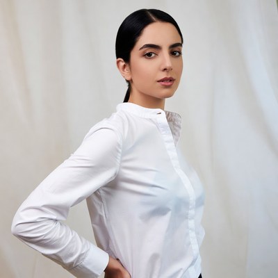 Woman in white shirt side profile