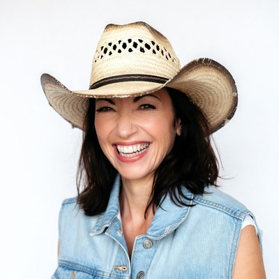 Smiling woman in straw cowboy hat