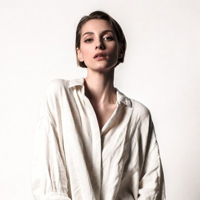 Woman in white shirt on white background