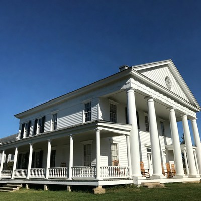 White Antebellum Mansion with Columns