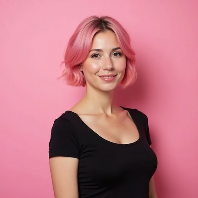 Woman with pink hair smiling