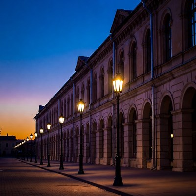 Historic Building with Street Lamps at Dusk