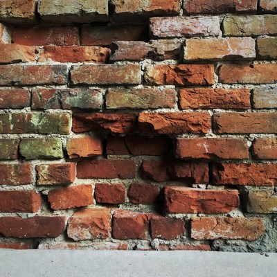 Old weathered brick wall