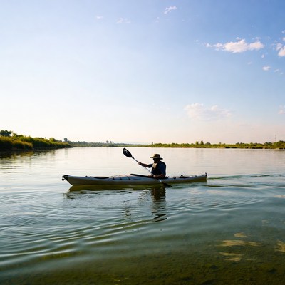 Man kayaking on river