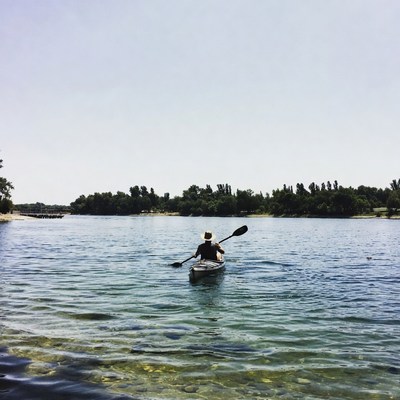 Man kayaking on river