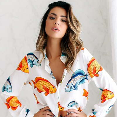 Woman in colorful fish print shirt