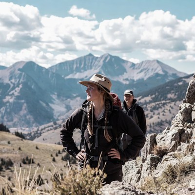 Woman and man hiking mountains