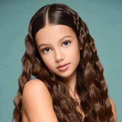 Teen girl with curly brown hair