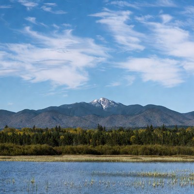 Snowy Mountain over Autumn Lake
