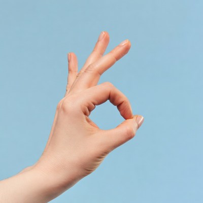 Hand making OK sign