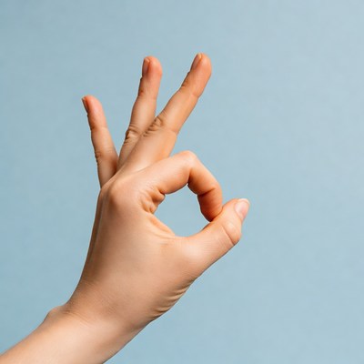 Hand making OK sign