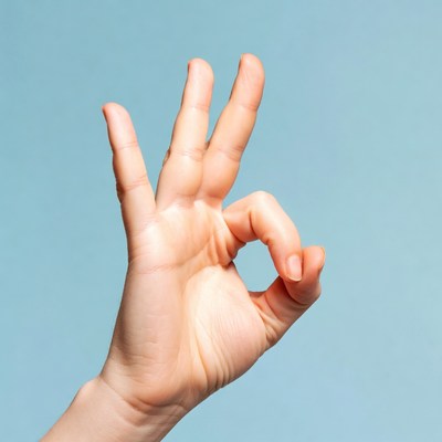 Hand making OK sign