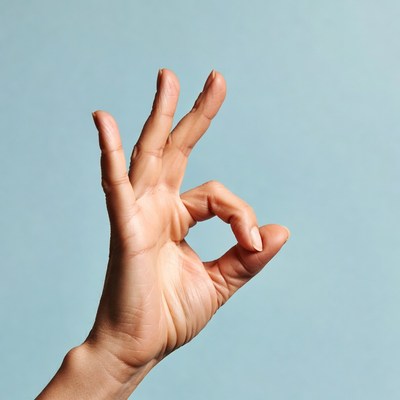 Hand making OK sign