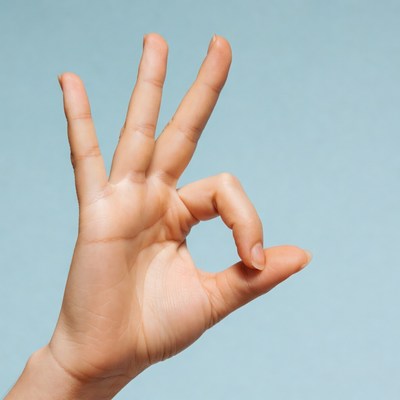 Hand making OK sign