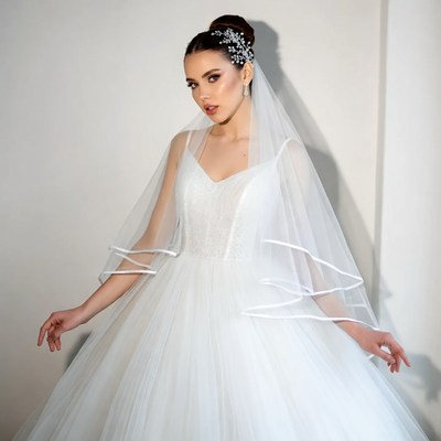 Bride in White Wedding Dress with Veil