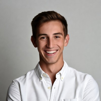 Smiling young man in white shirt