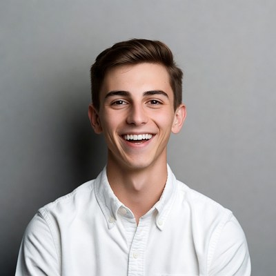 Smiling young man in white shirt