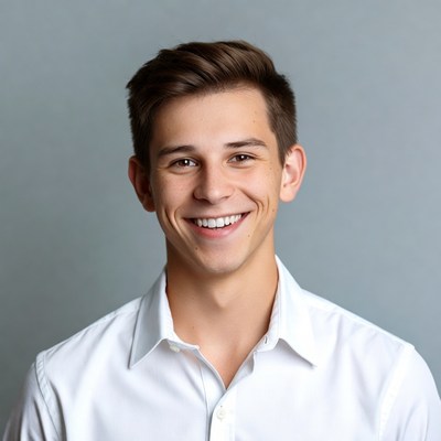 Smiling young man in white shirt